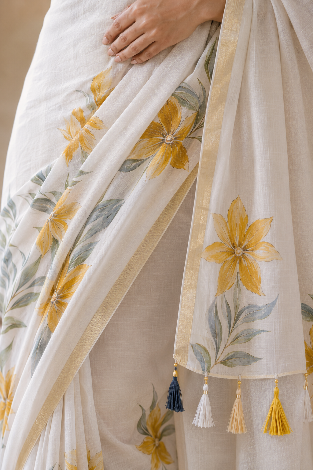 Fash'O'Holic Women's Premium White & Mustard Floral Printed Linen Blend Saree with Tassel Pallu